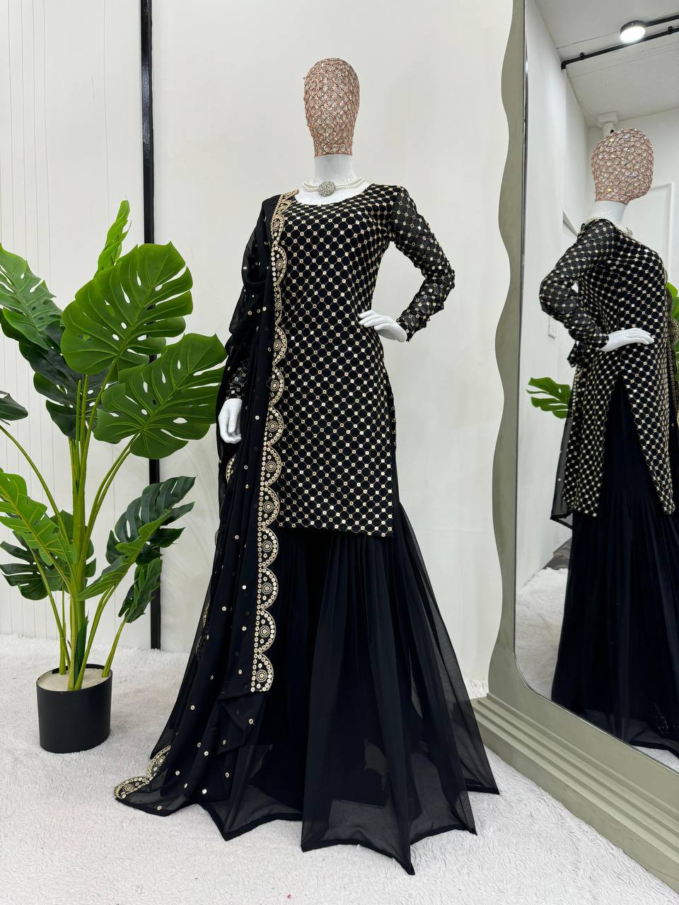 BLACK FAUX GEORGETTE SEQUENCE EMBROIDERED SARARA SALWAR SUIT WITH DUPATTA